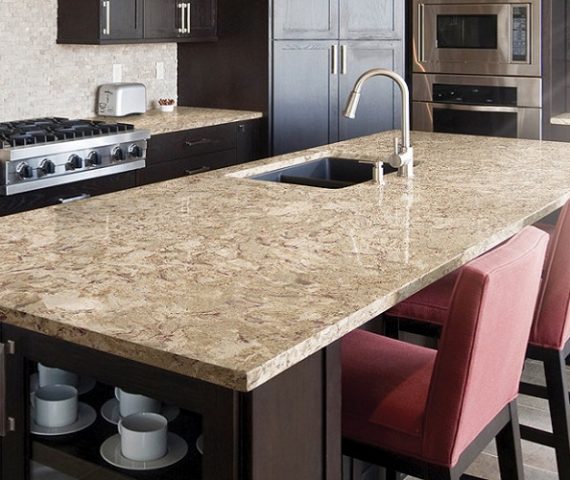 Tiles & Walls Spacious kitchen island featuring Cambria Nevern Quartz in a contemporary home.