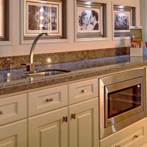 Kitchen with Cambria New Brighton quartz countertop and white cabinets