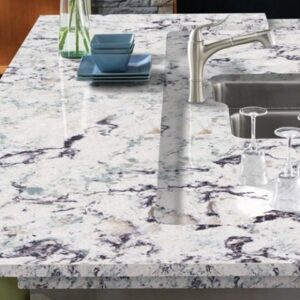 Cambria Praa Sands Quartz kitchen island with sink and glasses