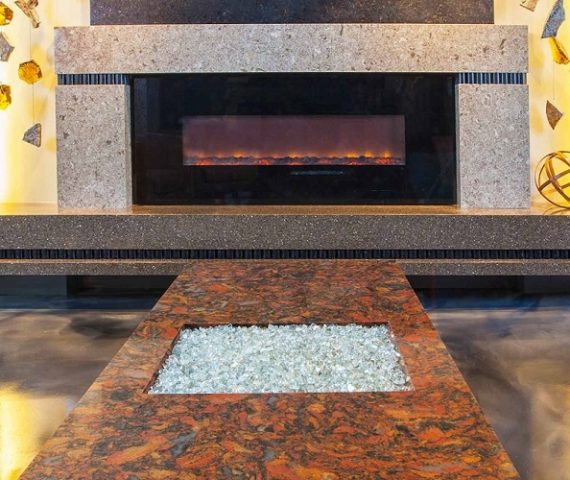 Flooring Cambria Rosslyn Quartz fireplace surround in a stylish living room