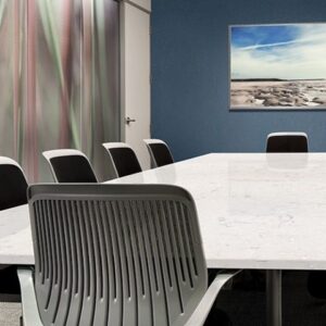 Modern office meeting room with Cambria Swanbridge Quartz table in London.