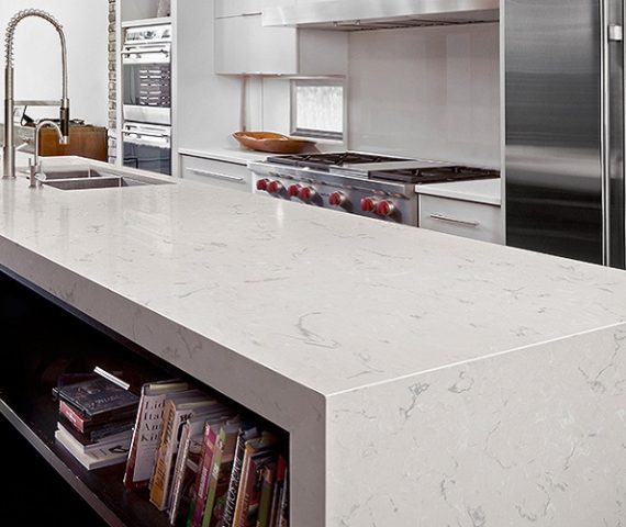 Tiles & Walls Stylish kitchen island featuring Cambria Swanbridge Quartz in a contemporary setting.