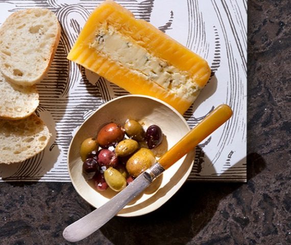 Tiles & Walls Cambria Wellington Quartz kitchen worktop with cheese and olives in Surrey