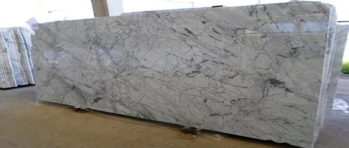 Carrara C - Worktops Slab of Carrara C Marble with grey veining