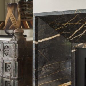 Port Laurent Marble fireplace surround in a stylish room