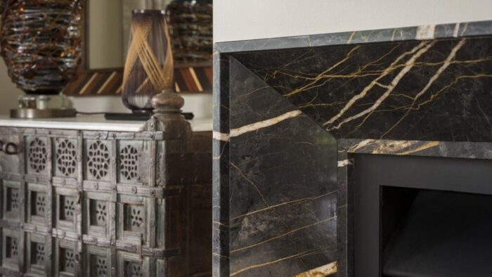 Flooring Port Laurent Marble fireplace surround in a stylish room