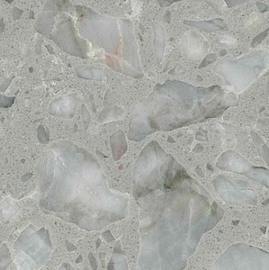 Compac Classic Grey - Worktops Close-up of Compac Classic Grey Worktop showing light grey base with white pebbles.