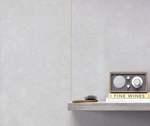 Flooring Compac New Beige Dune surface with radio and books, ideal for elegant UK interiors.