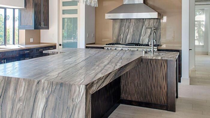 Tiles & Walls Elegant kitchen design with Sequoia Brown Quartzite worktop in Surrey