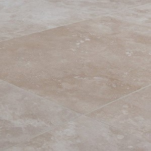 Ivory Travertine - Worktops Close-up of Ivory Travertine tile with natural texture