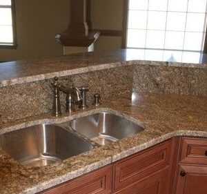 Kitchen worktop featuring Juparana Classico Granite with sink