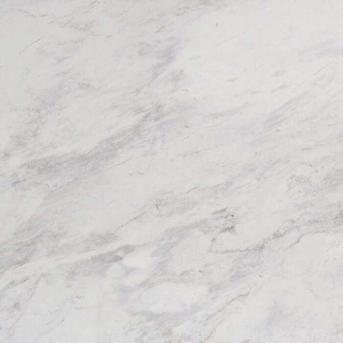 Volakas Marble - Worktops Close-up of Volakas Marble with ivory white and grey veining