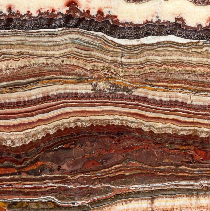 Fantastico Onyx - Worktops Fantastico Onyx showcasing rich brown, red, and white layers, ideal for luxurious interiors in London