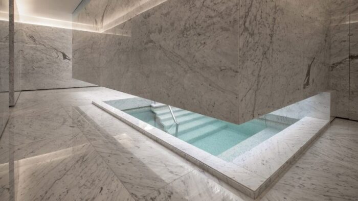 Flooring Luxurious interior featuring Ruivina Marble flooring and walls, ideal for sophisticated spaces in Surrey.