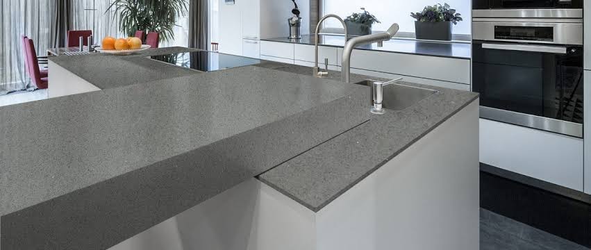 Modern kitchen with grey quartz worktop