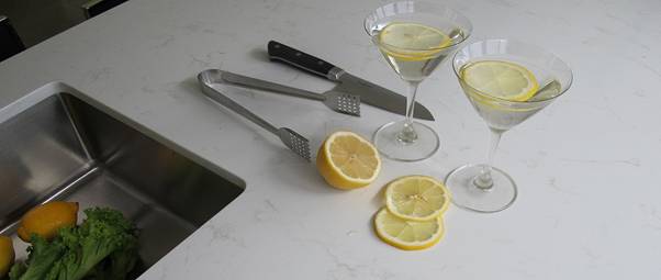 Kitchen worktop with martini glasses and lemon slices