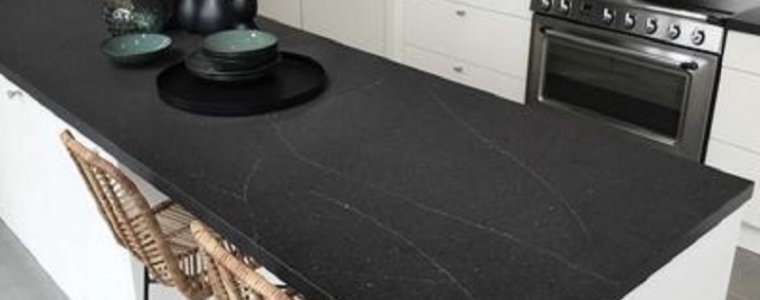 Black kitchen worktop with elegant design and modern appliances