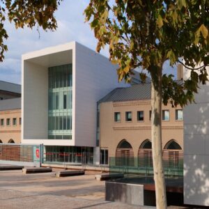 Modern building facade featuring Compac Afion White Stone in the UK