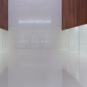 Sleek interior space with Compac Afion White Stone flooring