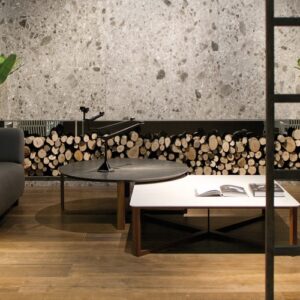 Living room featuring Ceralsio Ocean Stone wall in a modern London home.