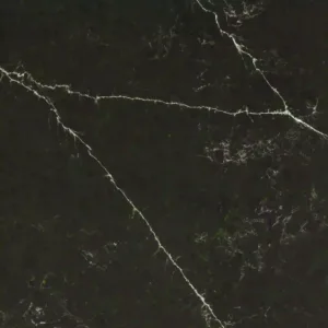 Close-up of Quartzforms Magnolia surface with black and green background and white veins
