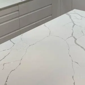 Modern kitchen island featuring Cimstone Calacatta Venato quartz in a London home.