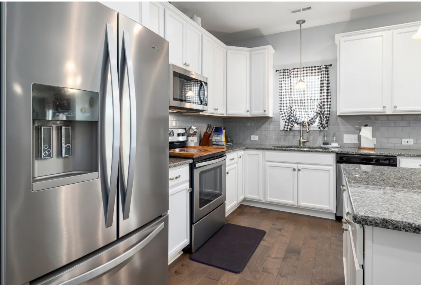 How to add value to your home. A kitchen full of grey modern appliances.